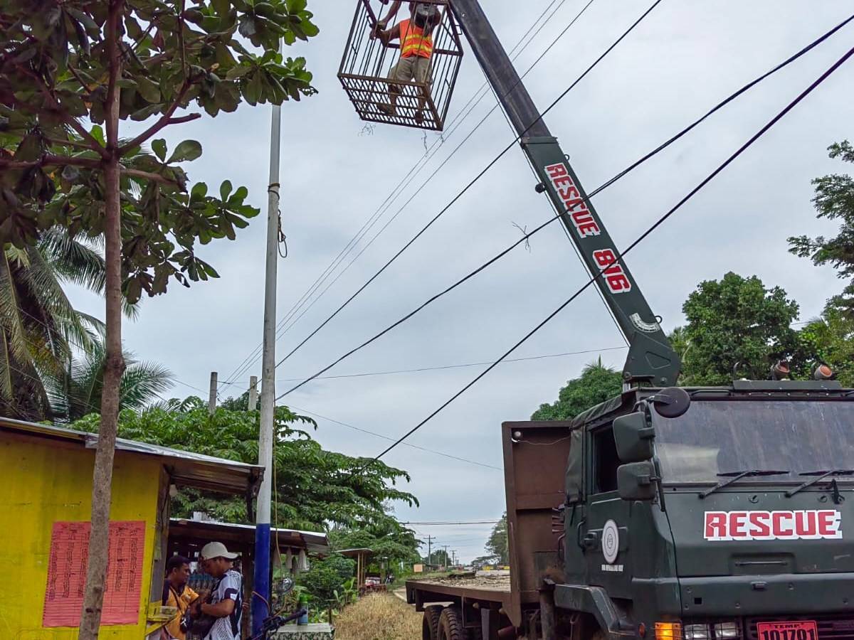 Installation of solar street lights with a crane truck