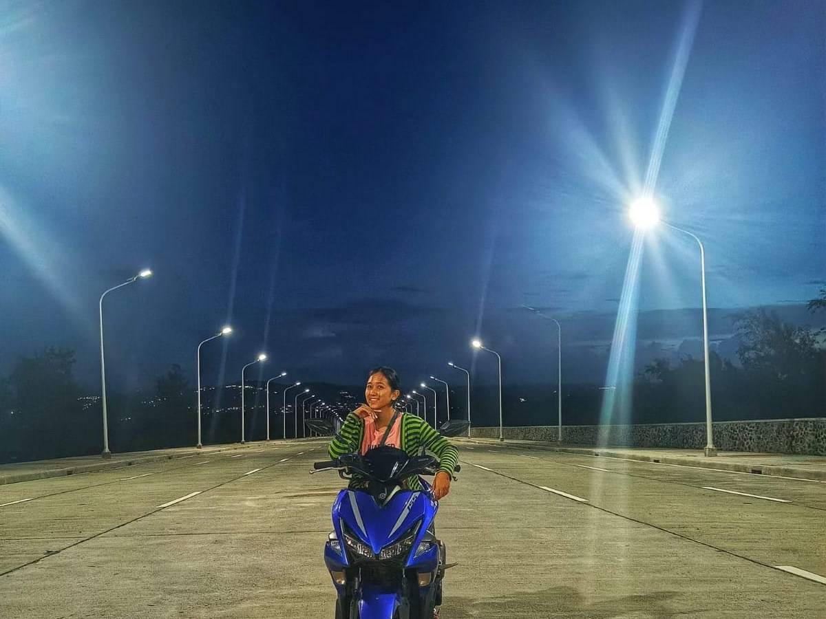 Road lit by all-in-one solar lights at night