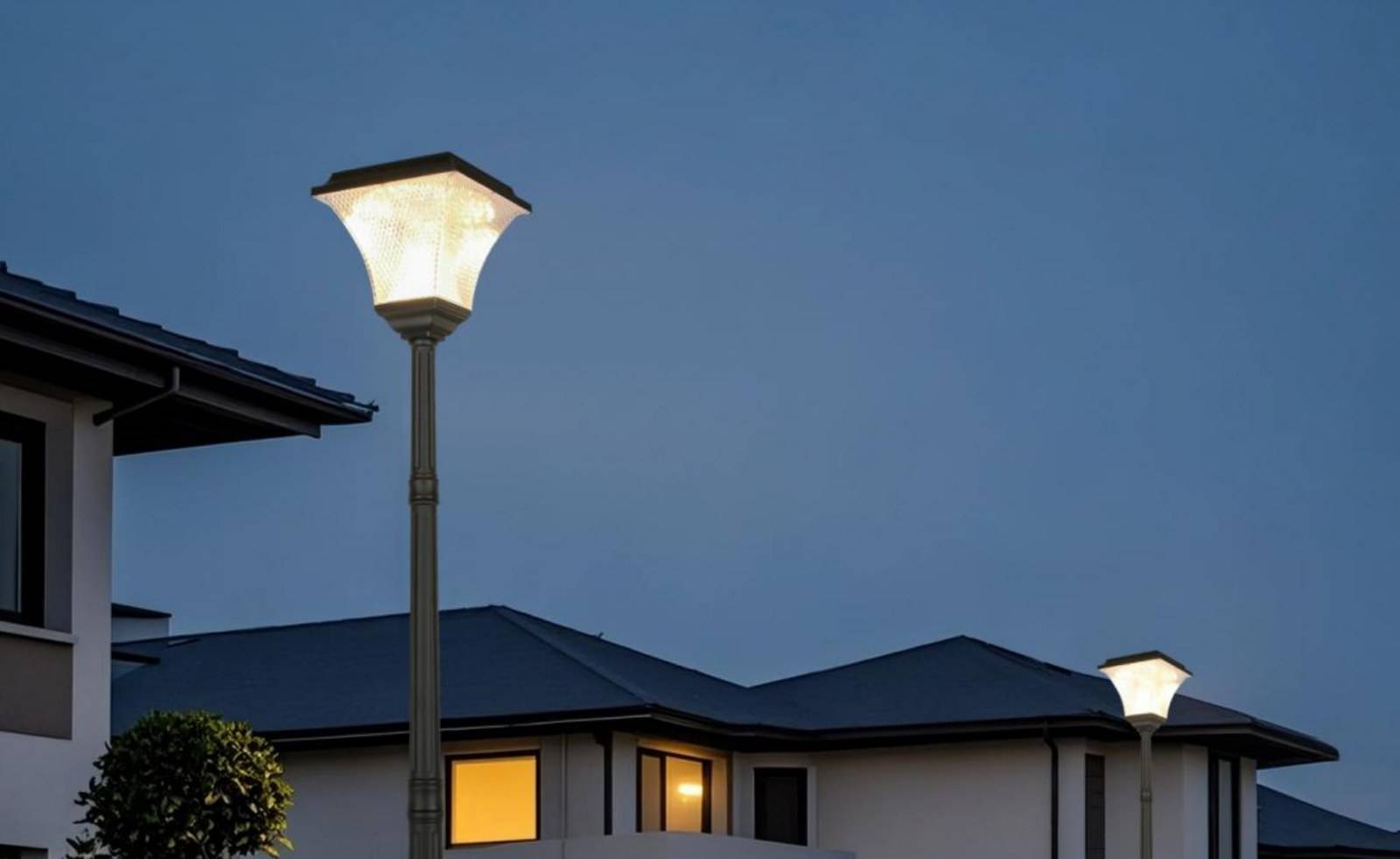 ZC-GGD3608 flared post-top luminaire lighting a driveway