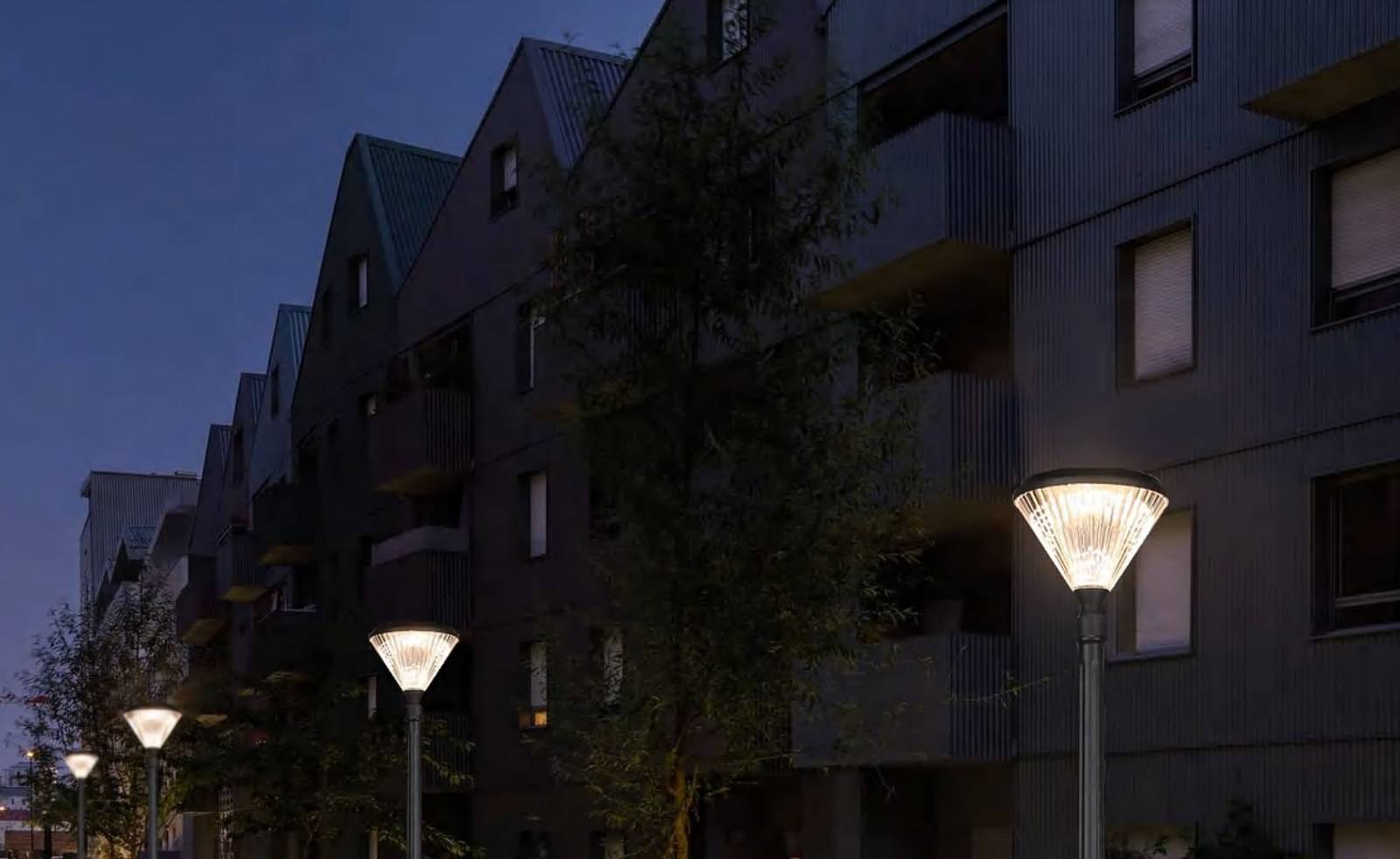 ZC-GGD4505-1 post-top luminaire beside apartment landscaping