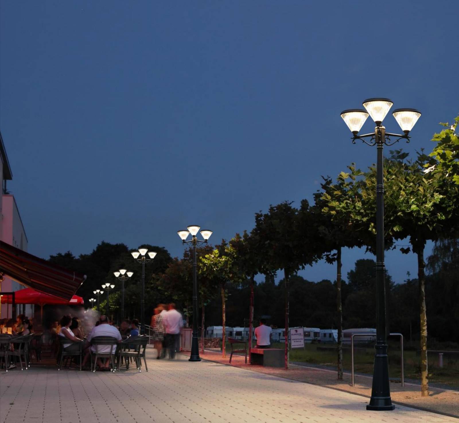 ZC-GGD4505-2 two-arm solar post lights along a waterfront promenade