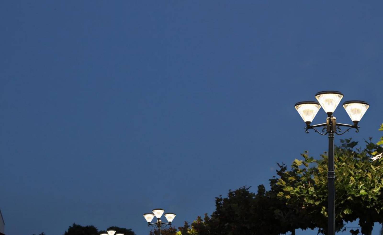 ZC-GGD4505-2 two-arm post lights in a public plaza